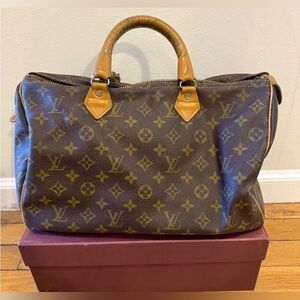 Louis Vuitton French luggage company speedy